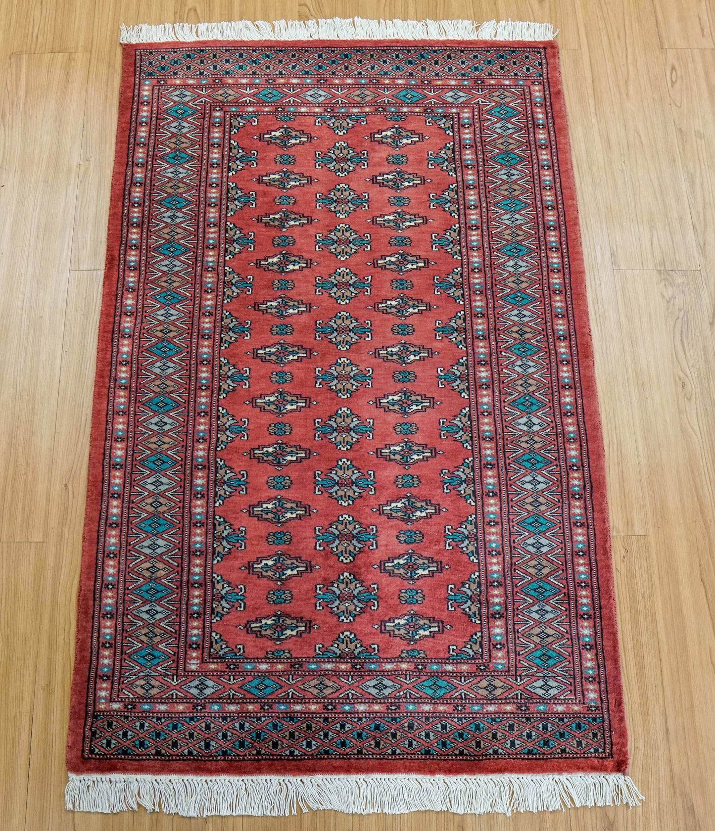  パキスタン手織り絨毯 トルクメンデザイン ピンク 127×81cm