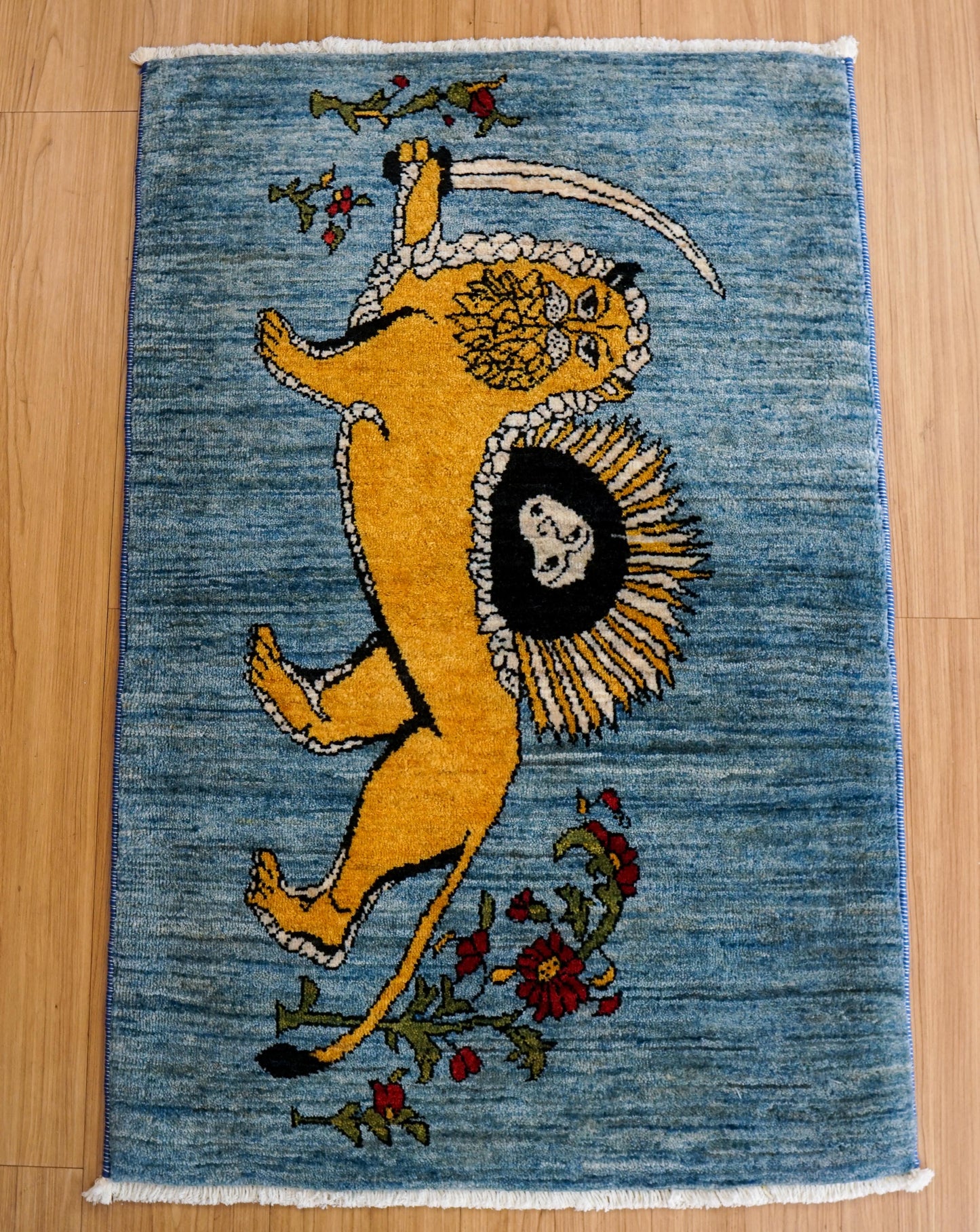 手織りペルシャ絨毯 カシュクリギャッベ リズバフト 98×66cm｜ライオンと太陽の文様・ブルー背景ギャベ