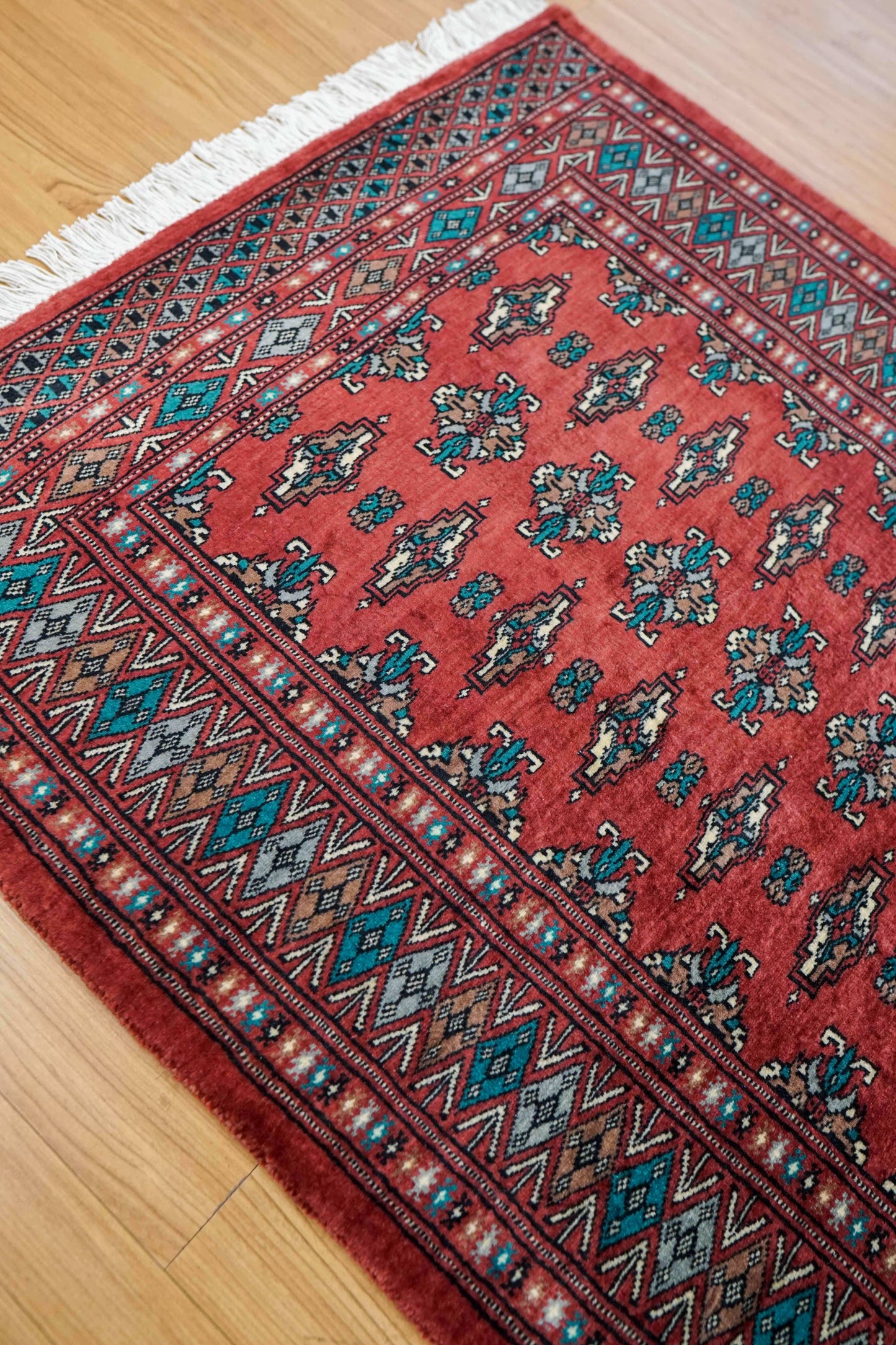  パキスタン手織り絨毯 トルクメンデザイン ピンク 127×81cm