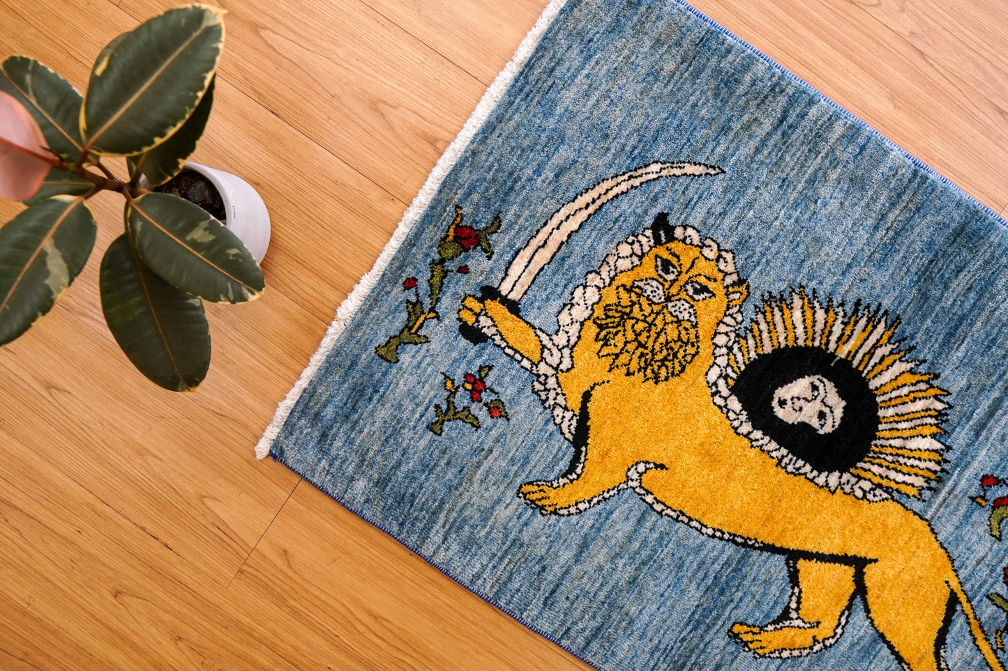 手織りペルシャ絨毯 カシュクリギャッベ リズバフト 98×66cm｜ライオンと太陽の文様・ブルー背景ギャベ