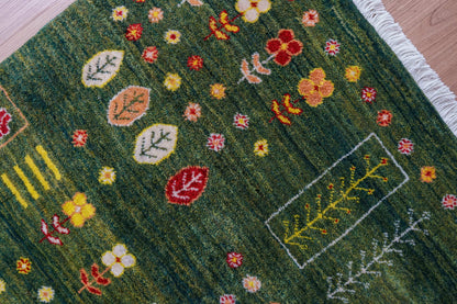  ペルシャ手織りカシュクリギャッベ リズバフト 93×62cm｜緑の草原と鳥のモチーフ・高密度織り ギャベ