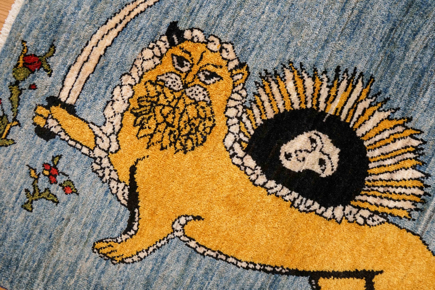 手織りペルシャ絨毯 カシュクリギャッベ リズバフト 98×66cm｜ライオンと太陽の文様・ブルー背景ギャベ