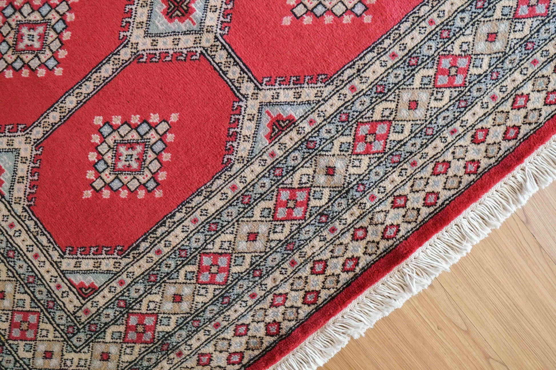  パキスタン手織り絨毯 ジャルダール トライバルラグ ピンクがかった赤 200×128cm